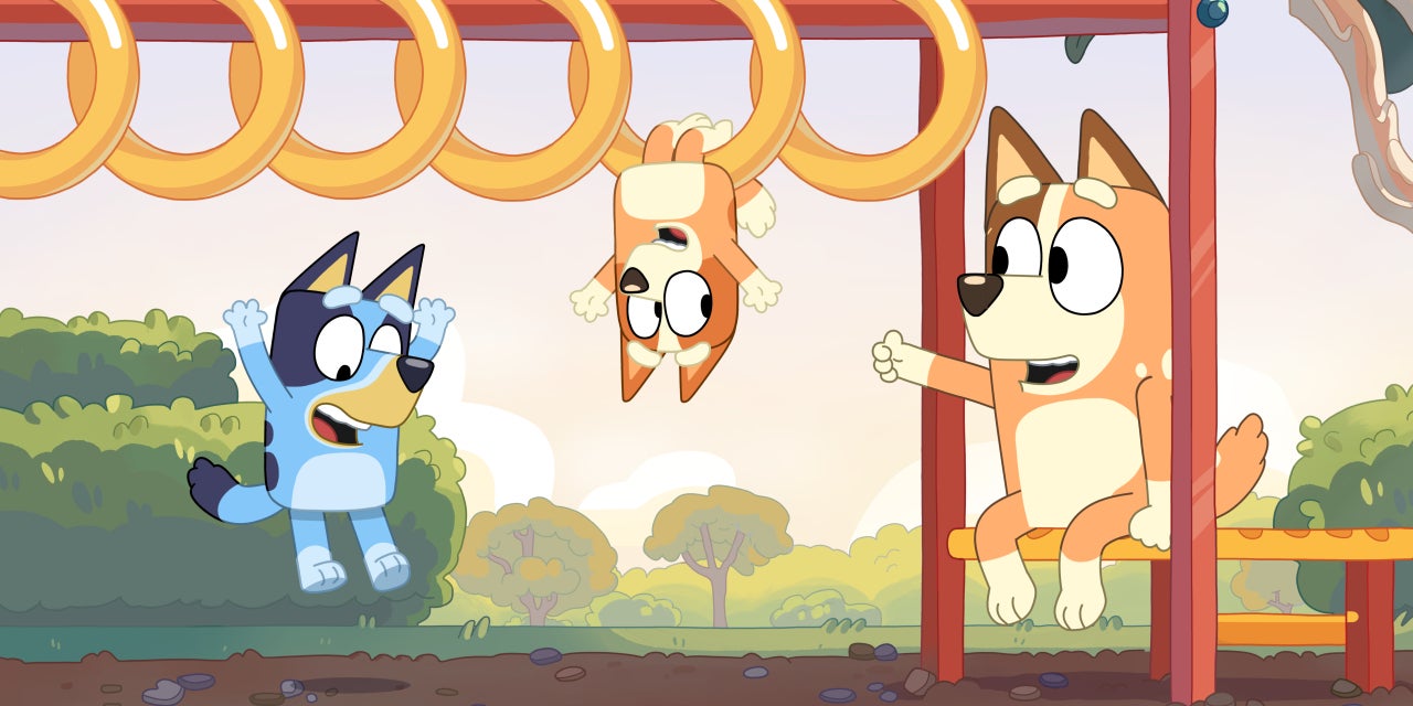 Cette famille animée de bouvier australien est l'idole des chiens...