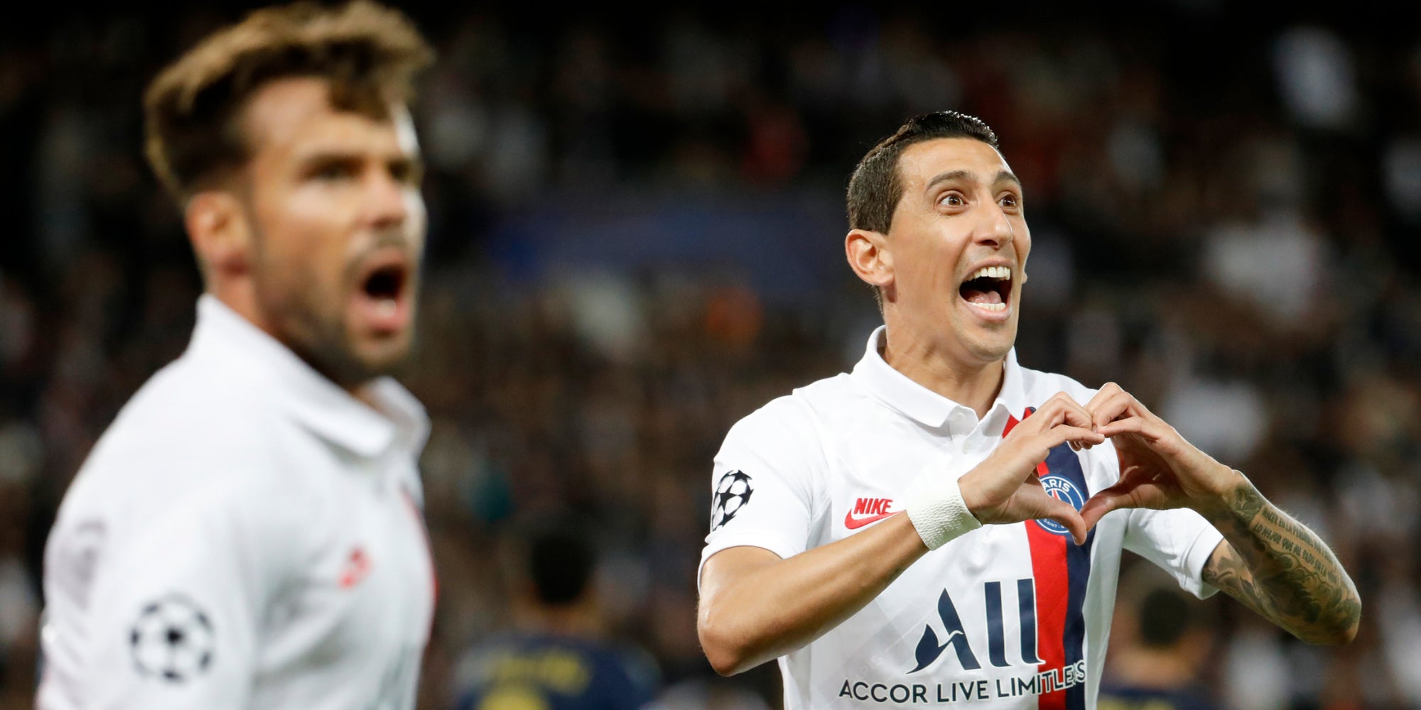 Di Maria et Bernat en joie pendant la victoire 3-0 du PSG face au Real Madrid le 18 septembre 2019.