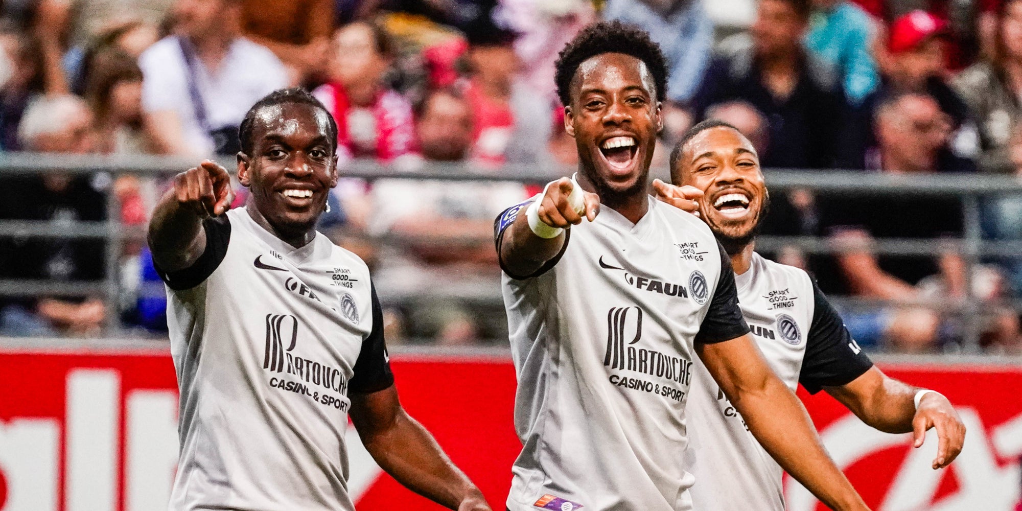 Elye Wahi, Faitout Maouassa et Arnaud Nordin lors de la rencontre Reims - Montpellier en Ligue 1, au Stade Auguste Delaune, le 3 juin 2023.