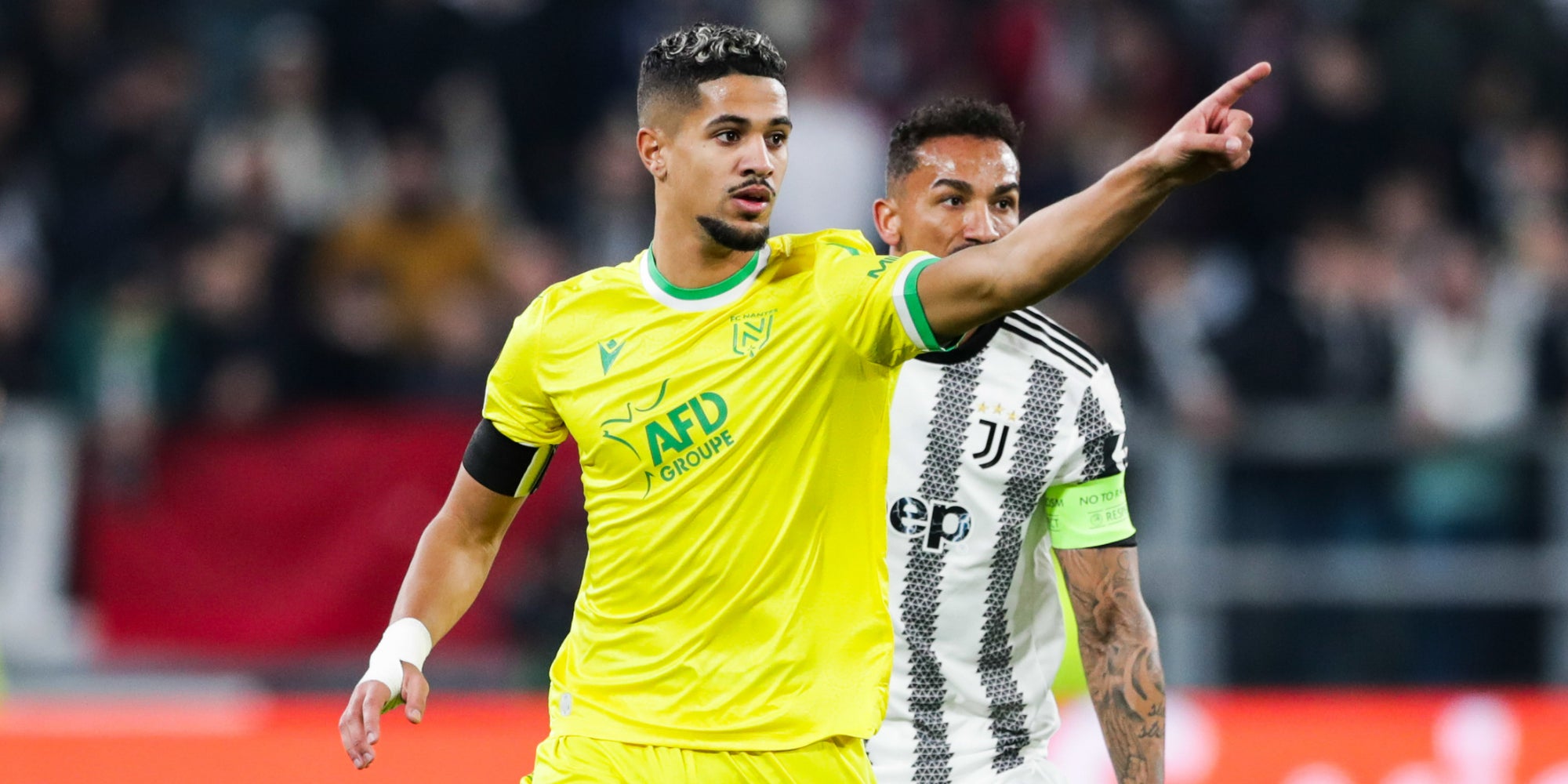 Ludovic Blas (FC Nantes) et Danilo (Juventus FC) lors du match aller de Ligue Europa opposant la Juventus à Nantes 