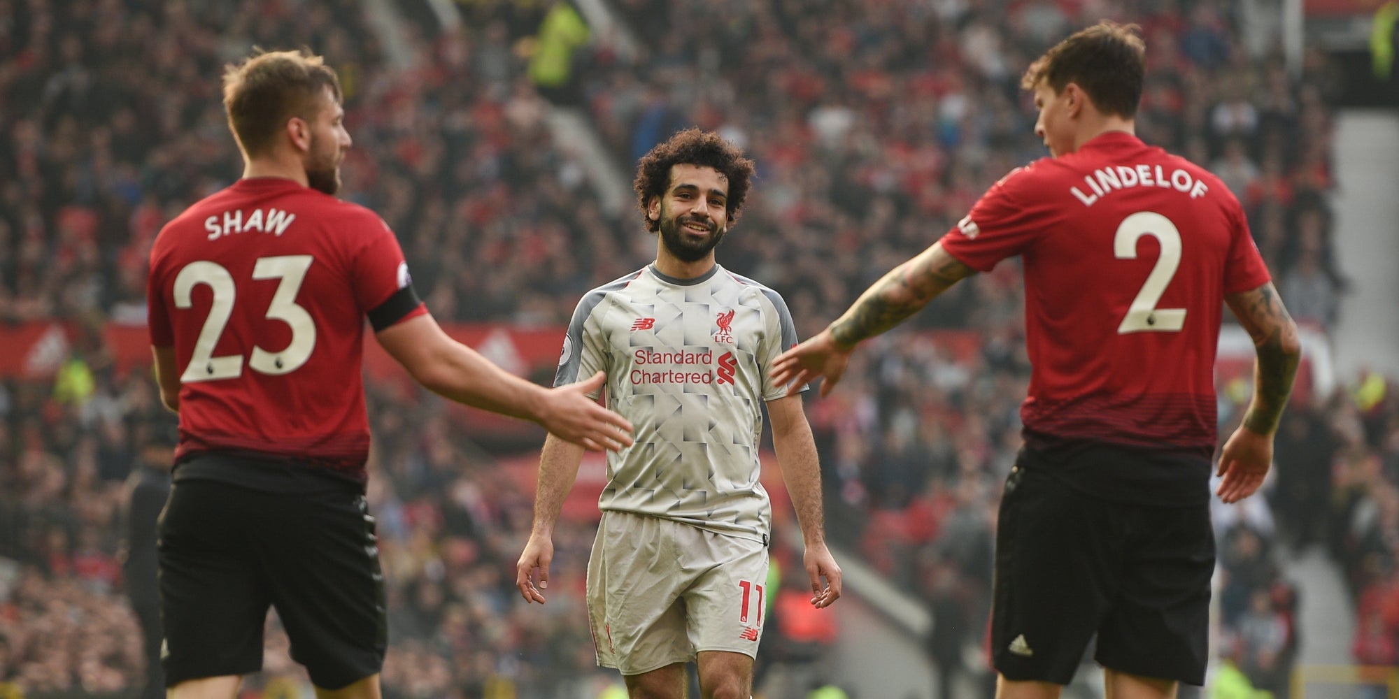 Shaw et Lindelof face à Salah lors du dernier Manchester United - Liverpool à Old Trafford, le 24 février 2019