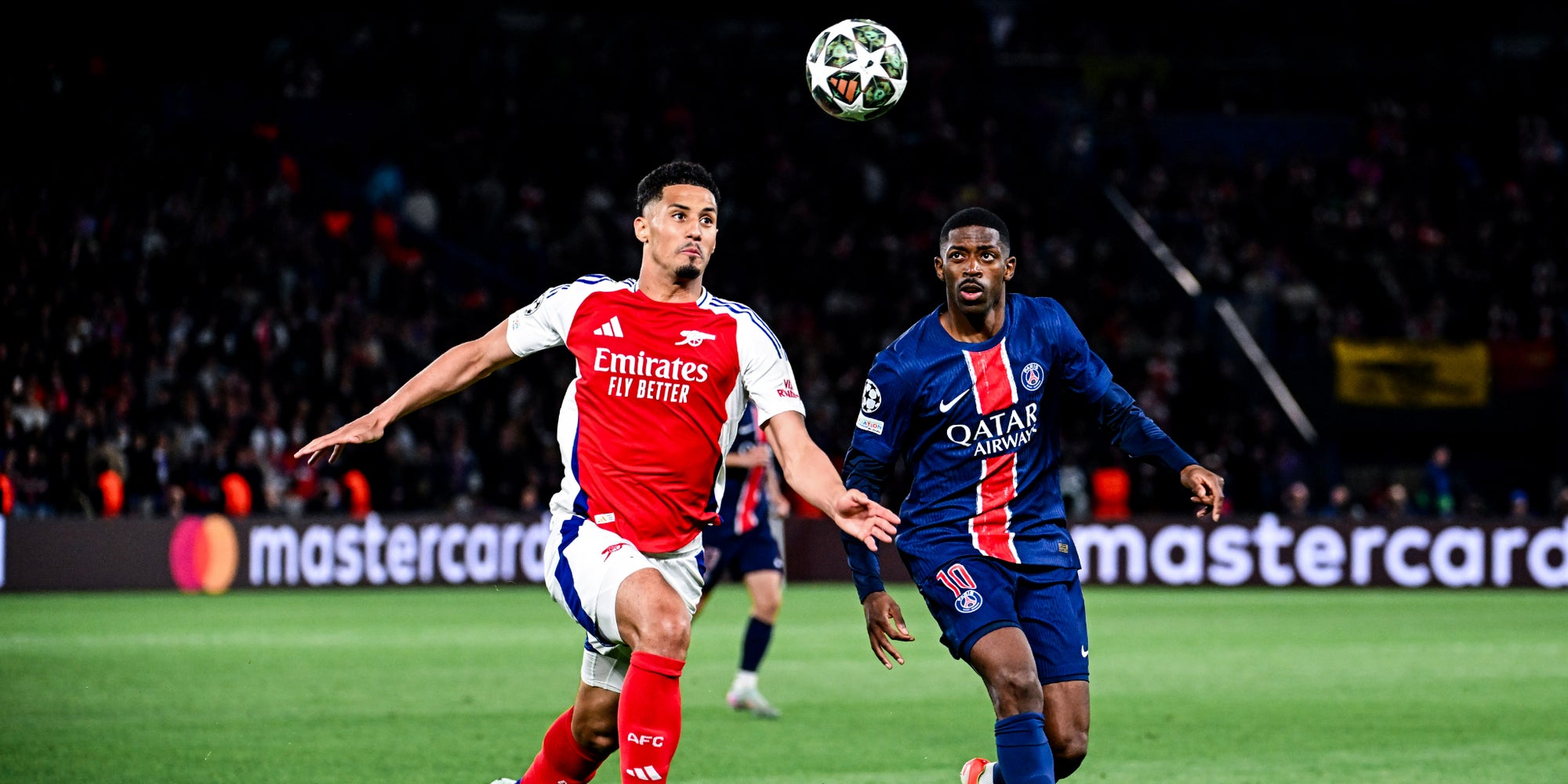 Ousmane Dembélé et William Saliba lors du match de Ligue des Champions entre le PSG et Arsenal, le 7 mai 2025 Parc des Princes (Paris).