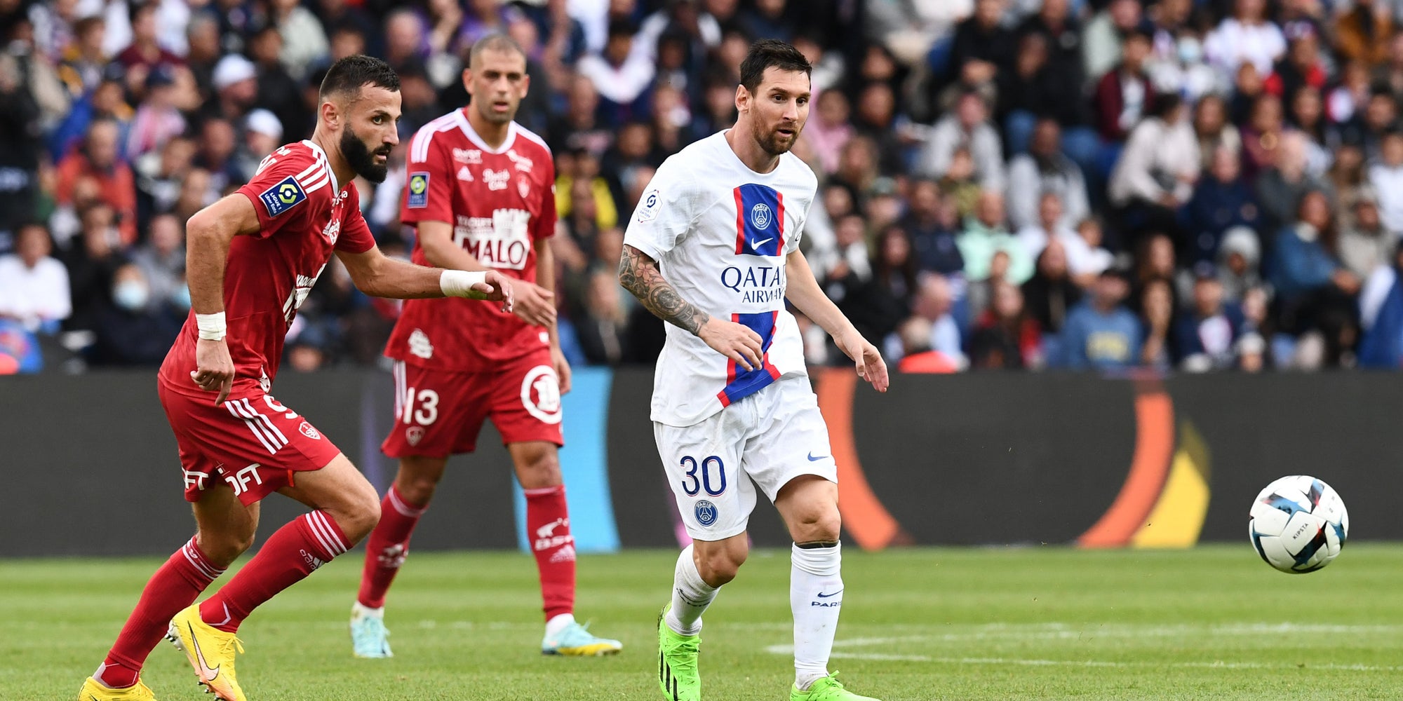 Franck Honorat (SB29) et Lionel Messi (PSG) lors de la rencontre PSG - Brest au Parc des Princes, le 10 septembre 2022