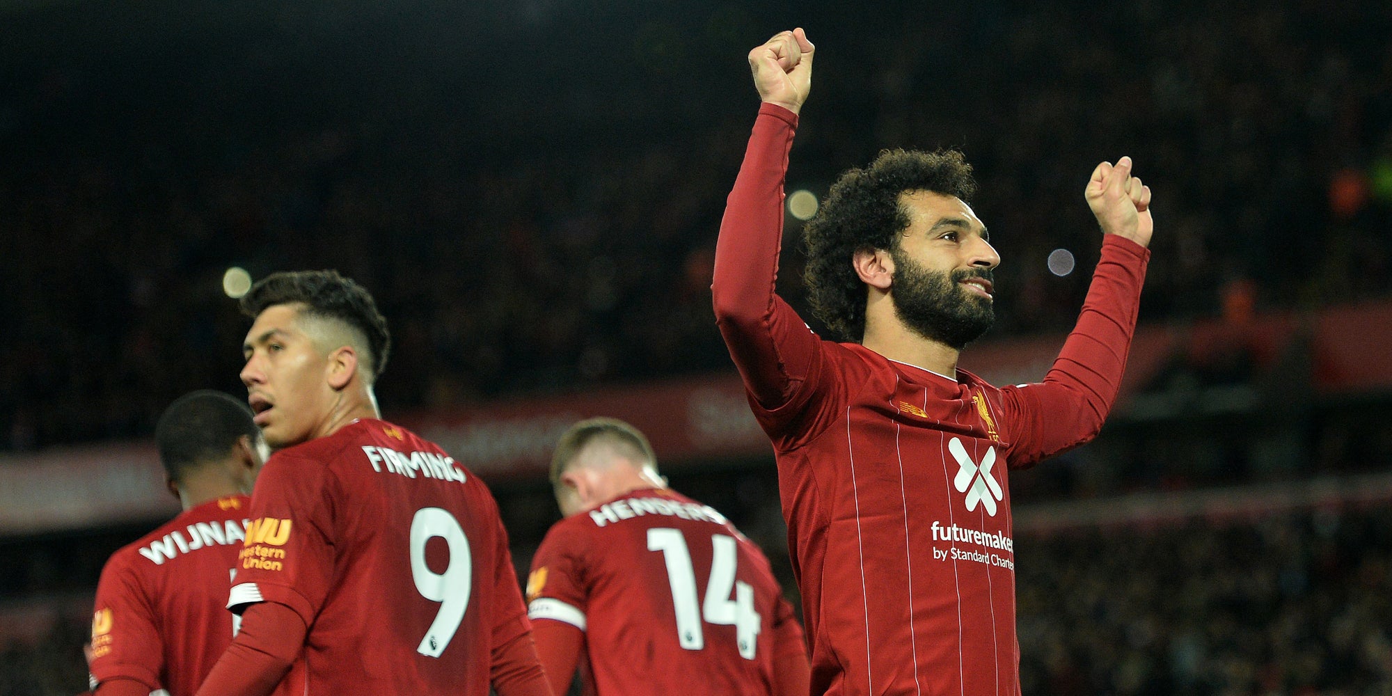 Salah, Firmino et les joueurs de Liverpool lors de la victoire face à Tottenham (2-1) à Anfield Road le 27 octobre 2019