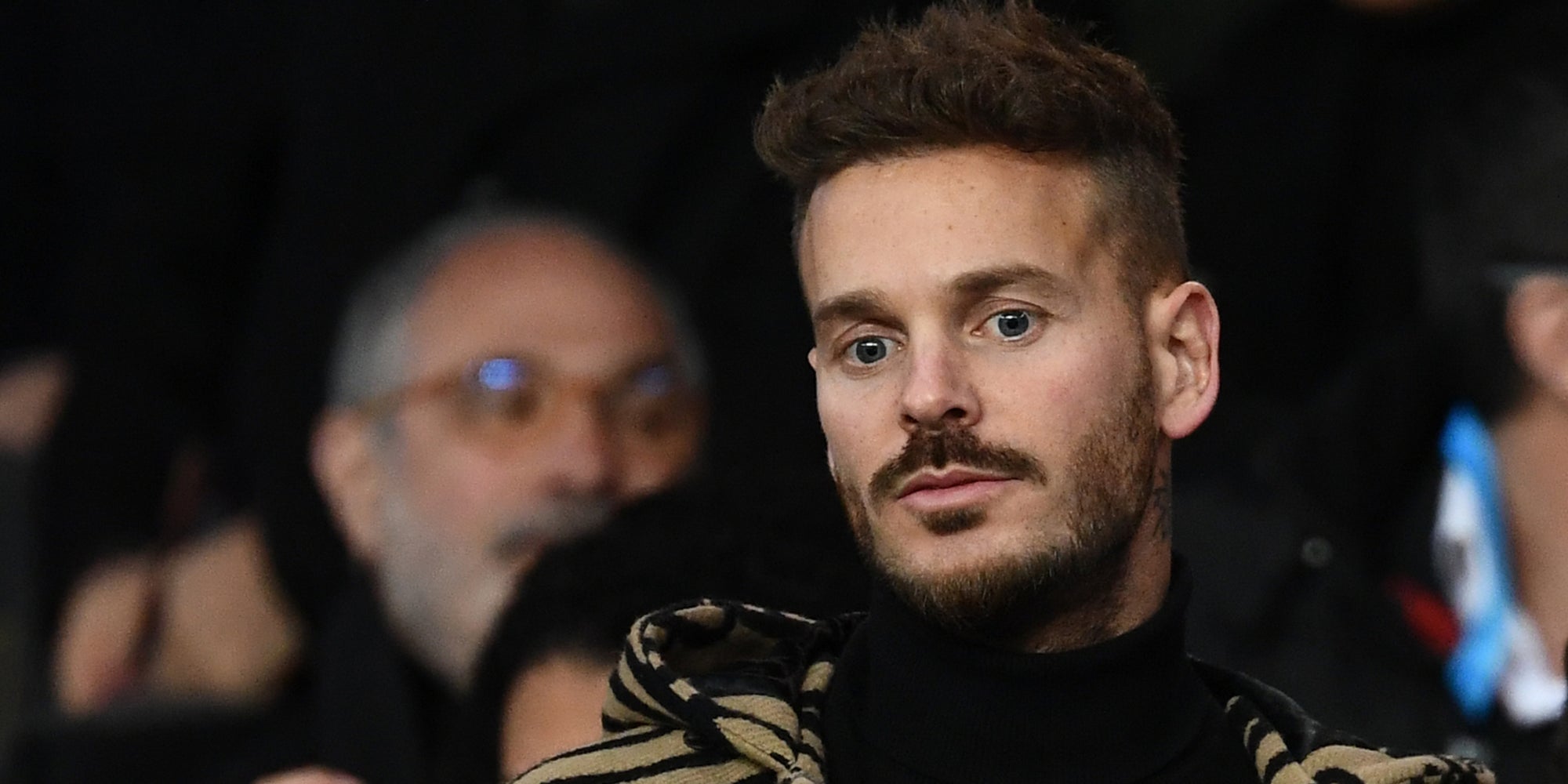 M Pokora lors du match PSG - OM en mars 2019.