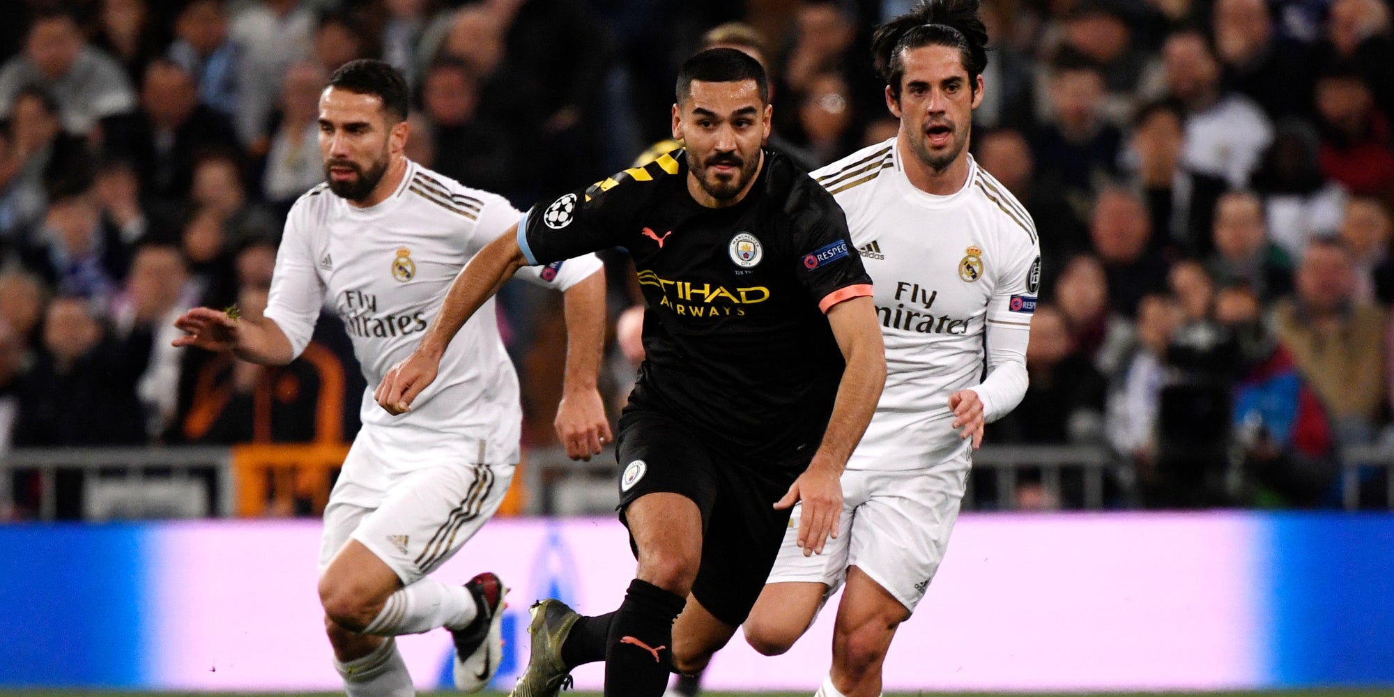 Gundogan poursuivi par les joueurs du Real lors de Real Madrid - Manchester City, le 26 février 2020 au Santiago Bernabeu, Madrid.