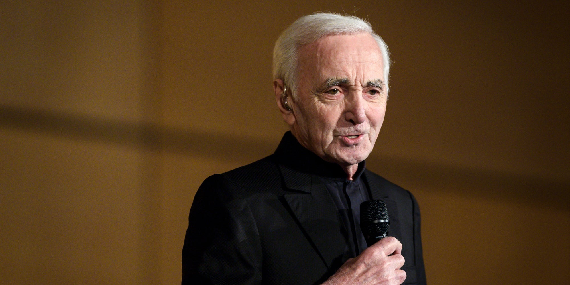 Charles Aznavour lors d'un concert organisé par l'Organisation internationale de la Francophonie à l'Office des Nations unies à Genève, le 13 mars 2018. Le concert a eu lieu avant le 17e sommet des pays francophones qui se tiendra à Erevan, la capitale arménienne.