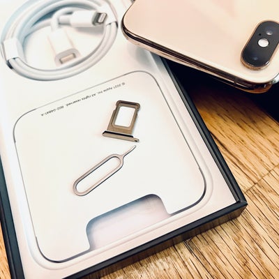 À quoi sert le trou sur la petite clé qui ouvre le tiroir des cartes SIM ?